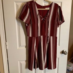 Maroon and white striped dress.